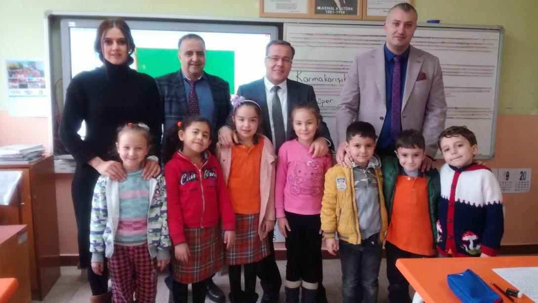 İlçe Milli Eğitim Müdürümüz Metin KOZ 75. Yıl ilk ve Ortaokulu ile Halk Eğitim Merkezi'ne ziyaret gerçekleştirdi.